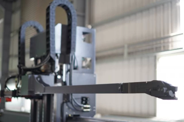 Advanced robotic arm for steel fabrication, showcasing automation technology by Guanda International Machinery.