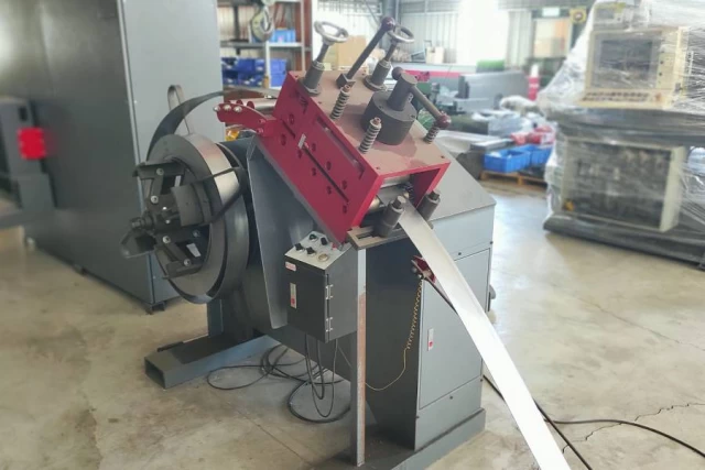 Coiling and feeding mechanism of the STM machine, showcasing advanced automation by Guanda International Machinery.